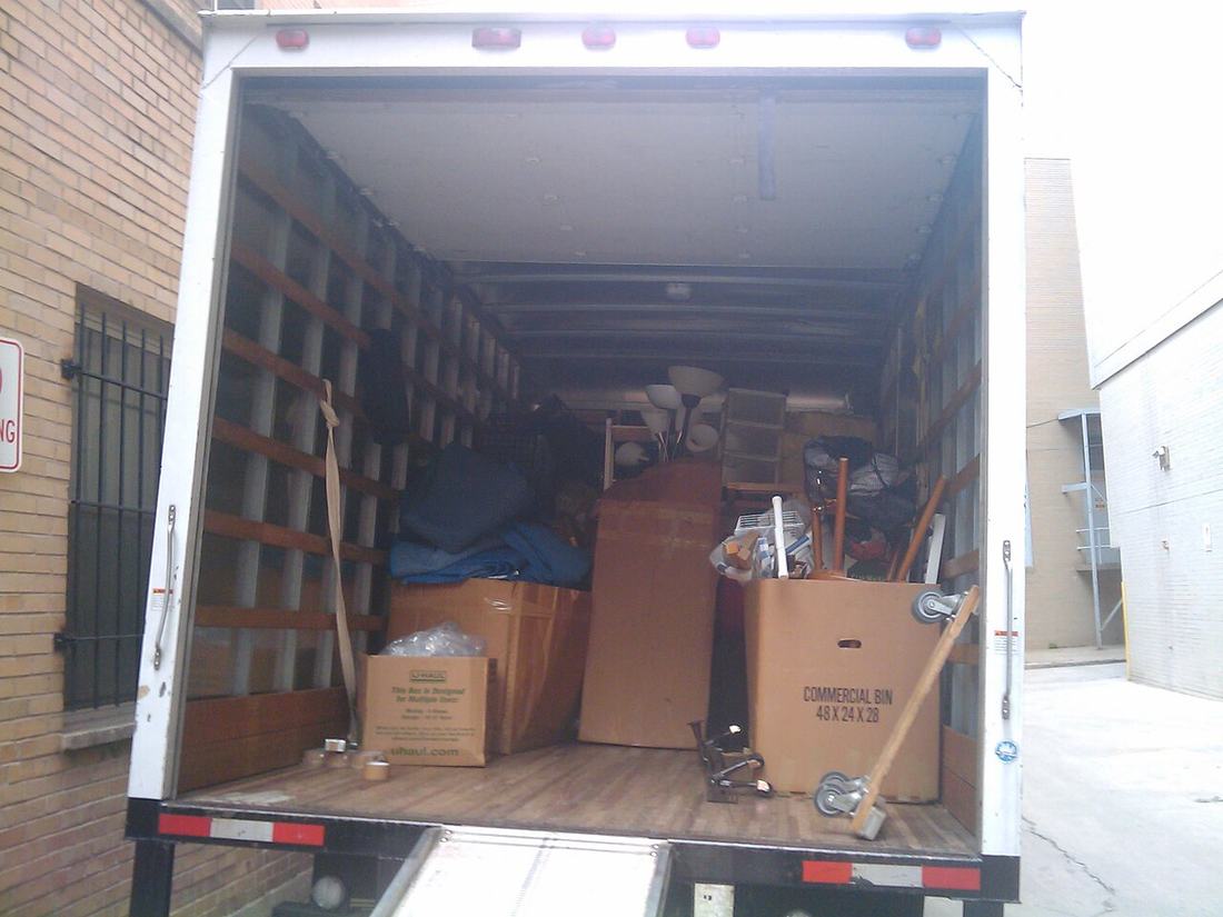 A moving truck loaded with boxes